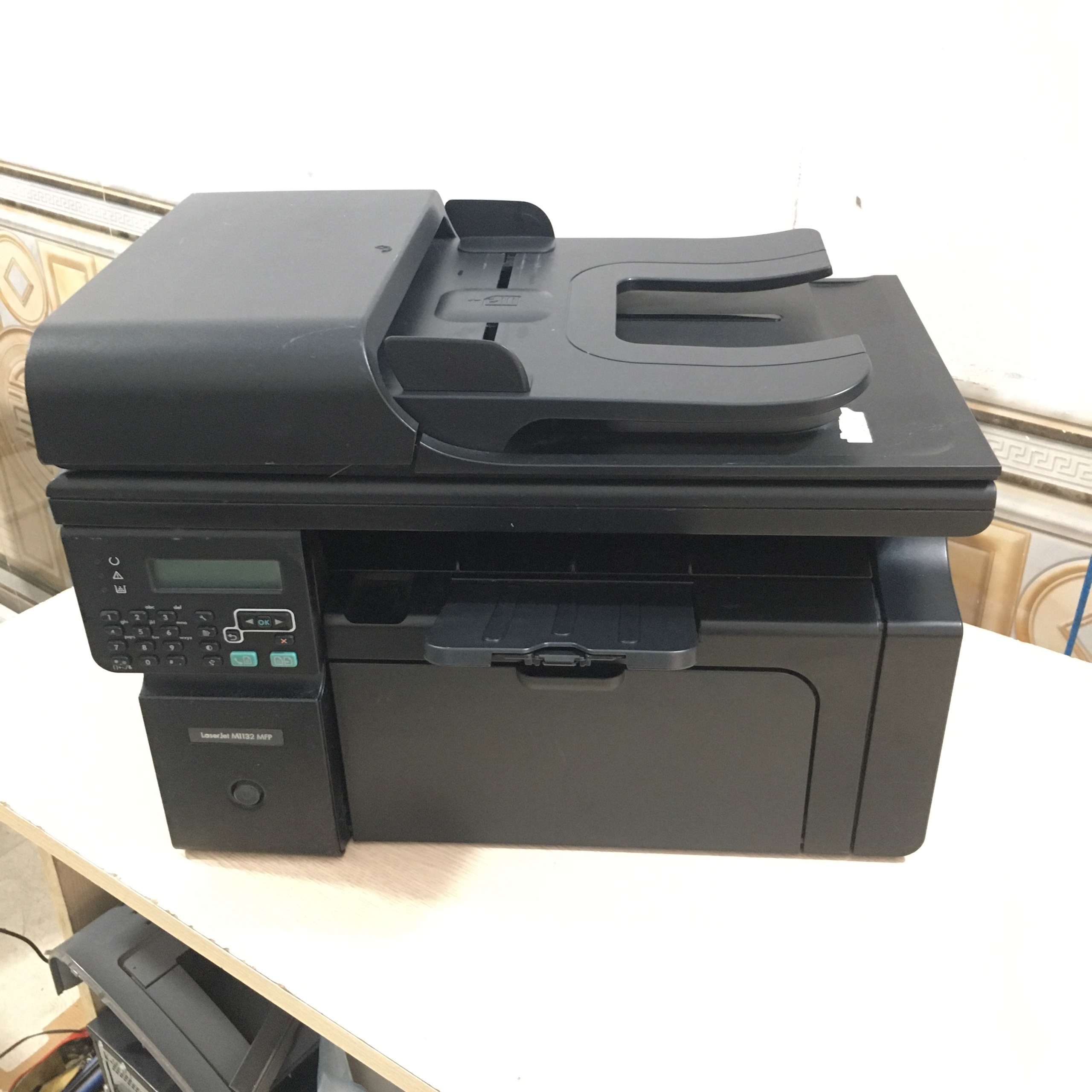 Máy In Đa Năng Văn Phòng ( In 1 Mặt A4 , A5 Nhỏ Gọn /Photo/Scan Mặt Gương và Khay ADF ) - HP 1212nf ( Tặng Hộp Mực Đa Năng - Dây Nguồn , Cáp in Mới 100% Đi Theo Máy ) (Mã SP: máy in canon 1210)