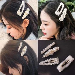 Set 4 kẹp tóc ngọc trai