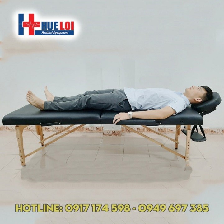 Giường spa chân gỗ gấp gọn hình valy