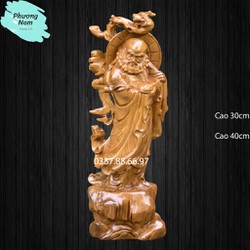 Tượng đạt ma quá hải cao 30cm chất liệu gỗ bách xanh