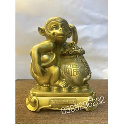 Tượng Khỉ ngồi bệ ôm túi tiền bằng đồng vàng cao 22cm